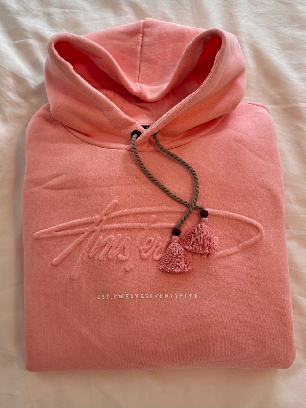 Embossed Hoodie with Tassel Drawstrings